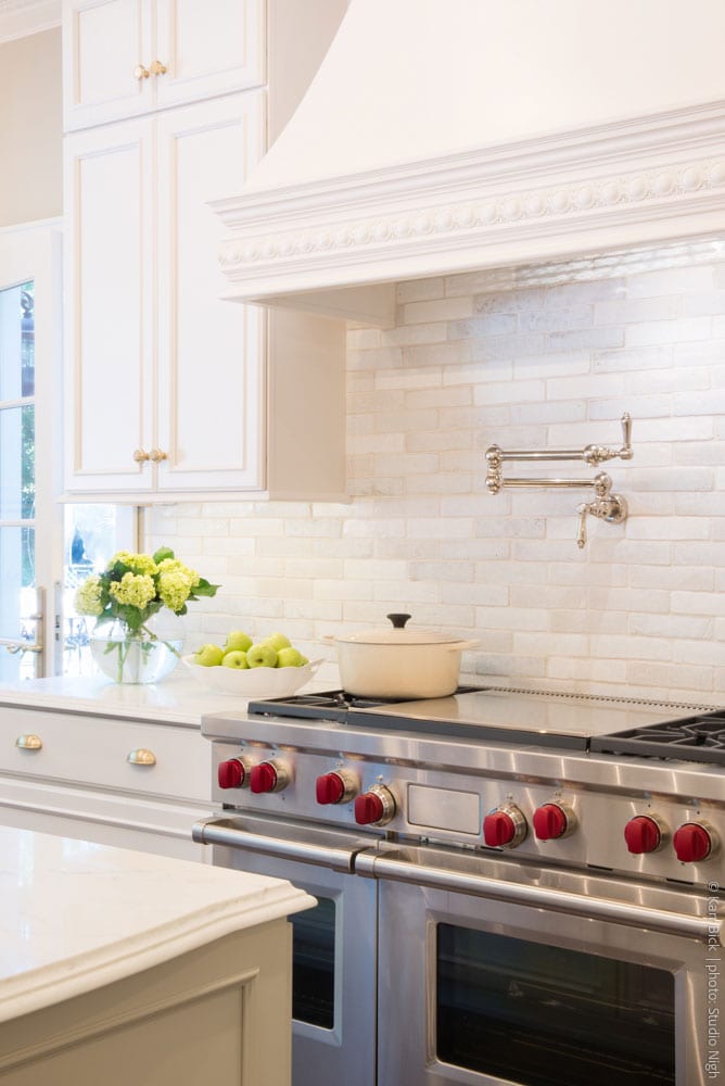 kitchen remodel white cabinets, subway tile, gold accents