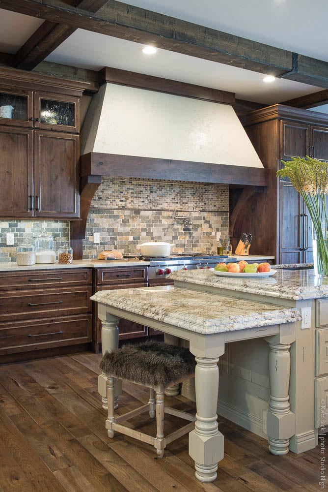 rustic cabinets with stucco hood kitchen remodel