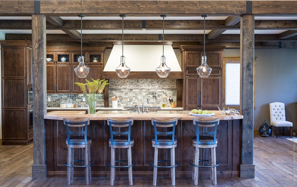 2 level kitchen island with rustic beam ceiling remodel