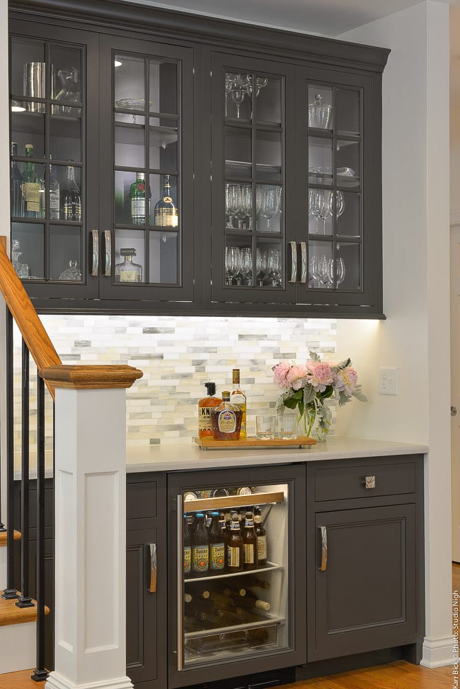 dark grey bar with glass and wine fridge remodel