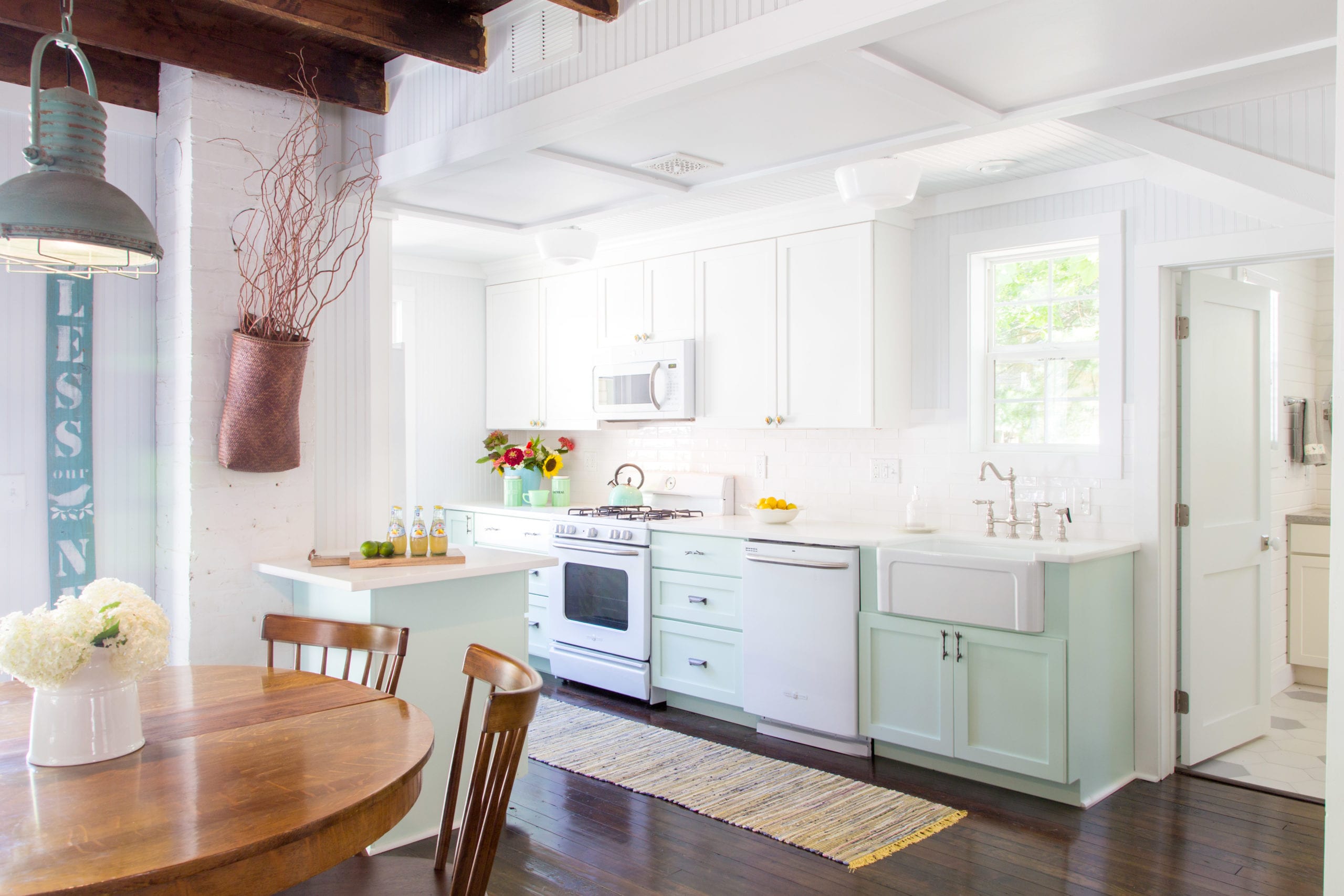 cottage kitchen remodel with mint cabinets