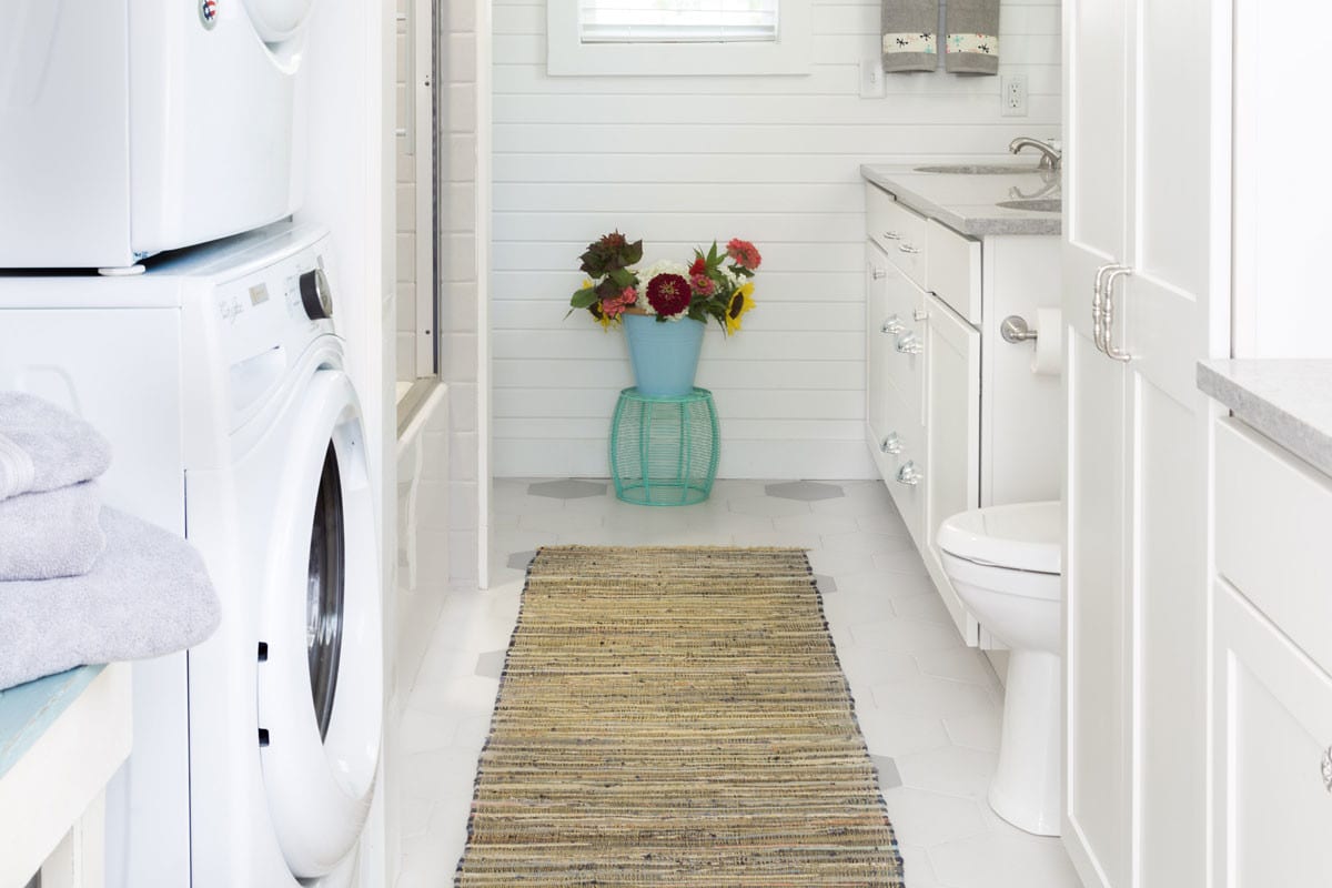 a bright white laundry and bathroom remodel