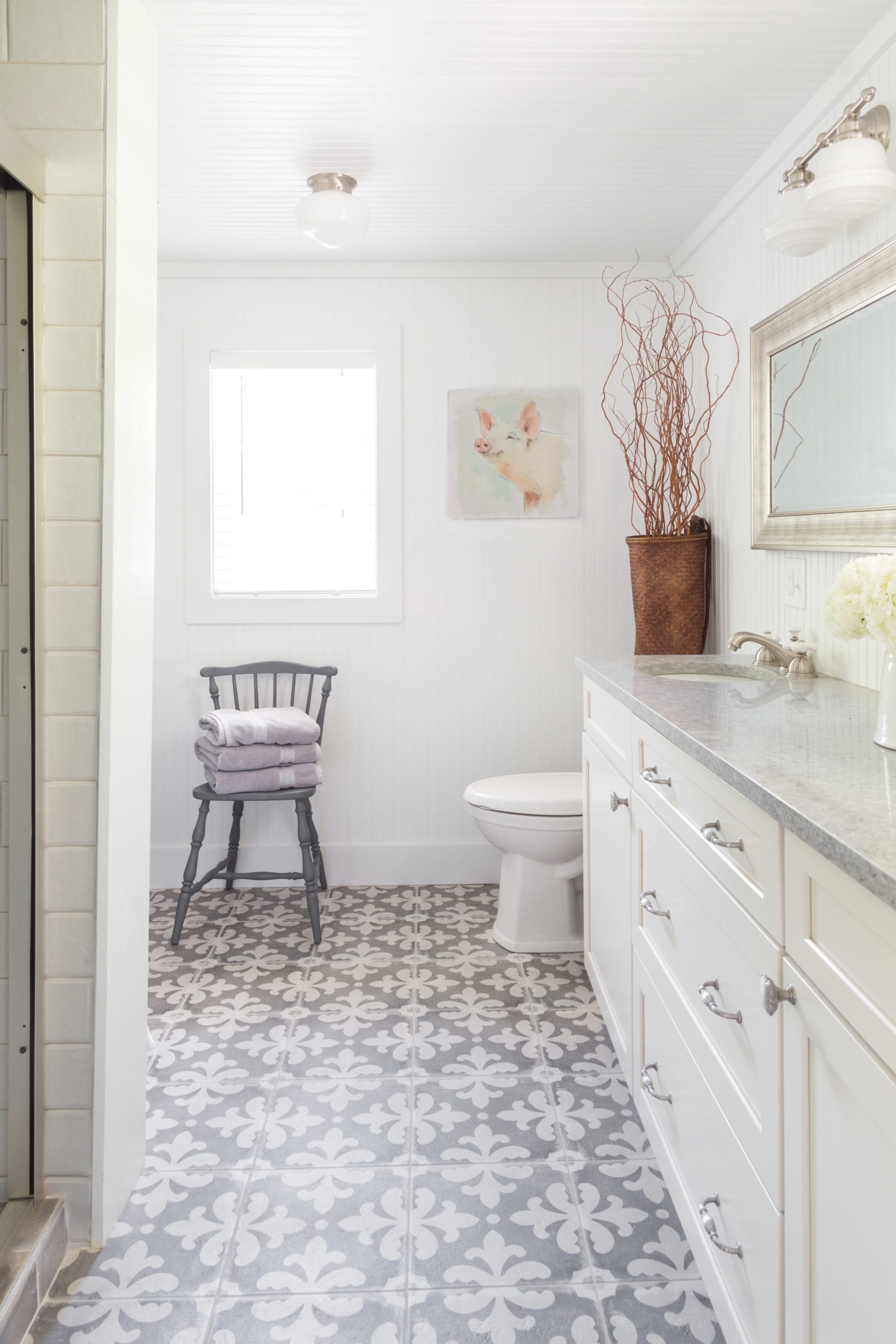 grey pattern tile floor with shaker cabinet remodel