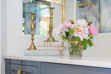 close up of floral and antique decor with gold accents