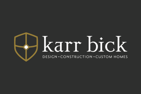 The Karr Bick logo and tagline against a charcoal black background