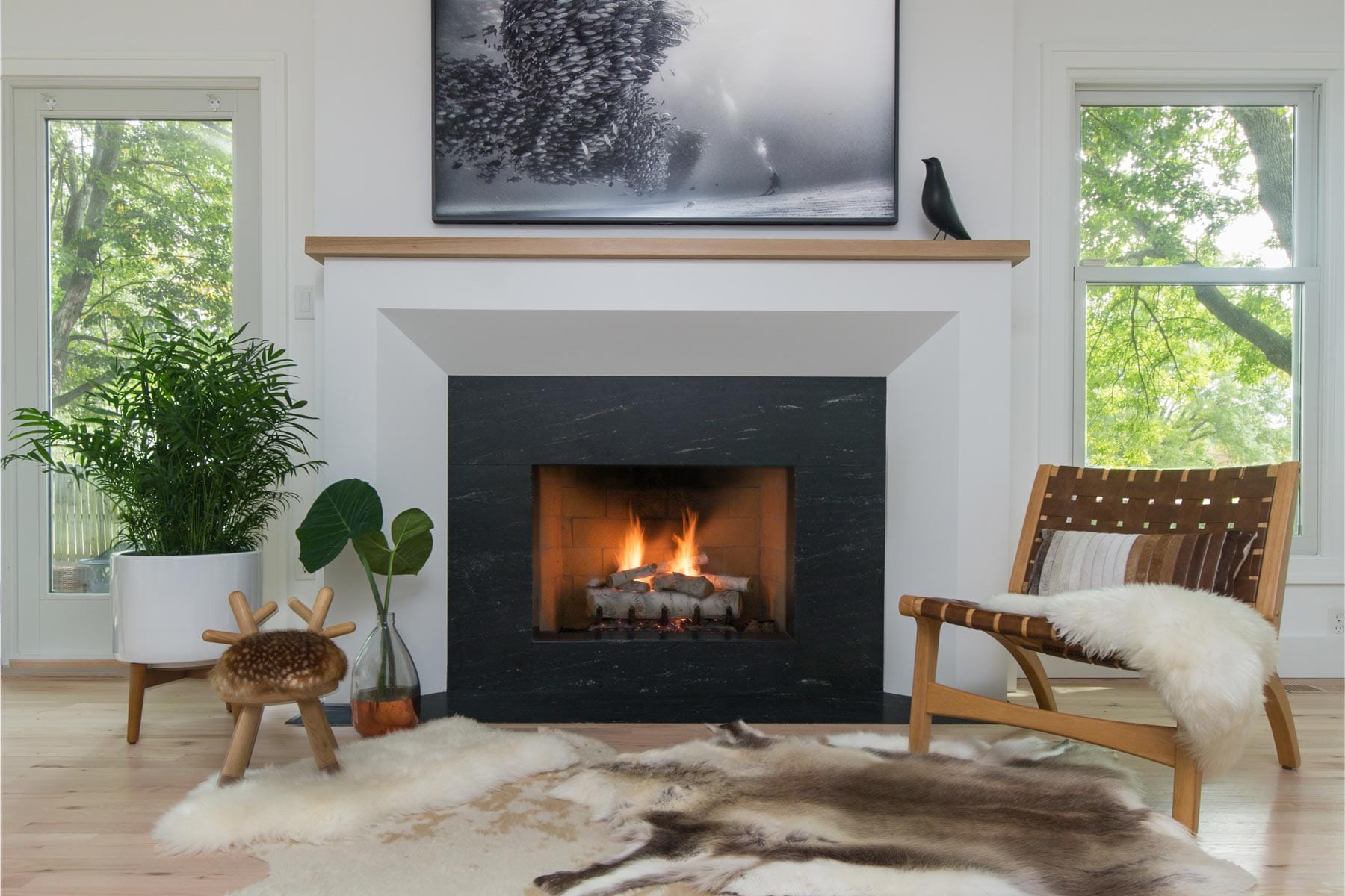 a black and white Scandinavian styled fireplace