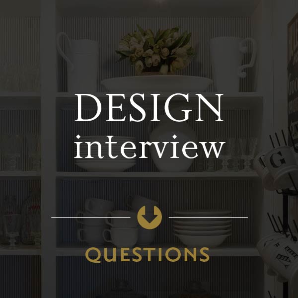 A graphic with white text that reads "Design Interview" with an arrow pointing down to the text "Questions"