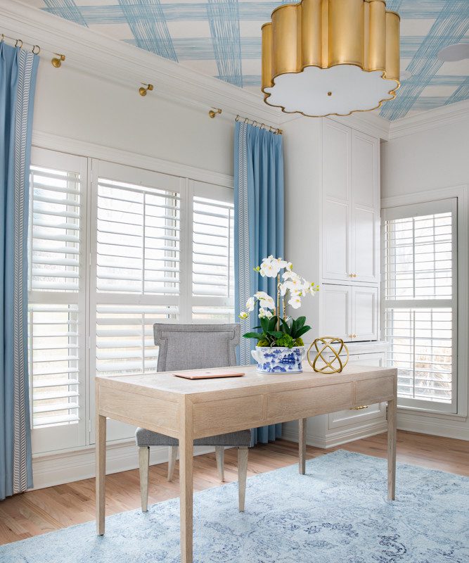 bright and airy office space with blue and gold accents