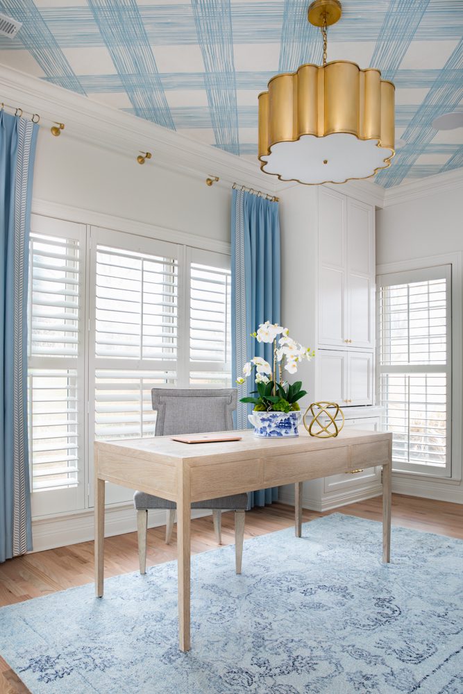 bright and airy office space with blue and gold accents