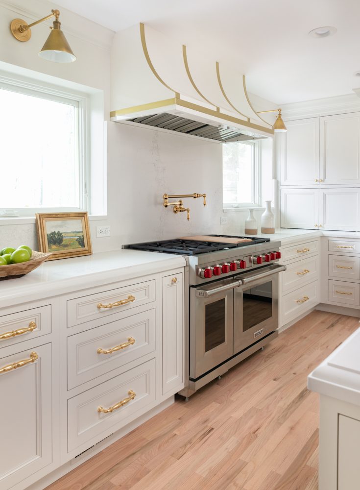 bright white kitchen with gold accents