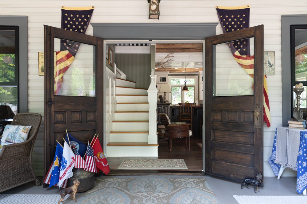 entry way with wooden double doors