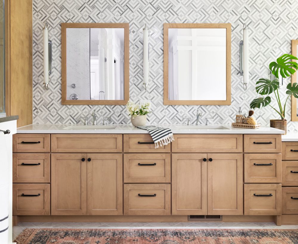 large double vanity with geometric wall behind it