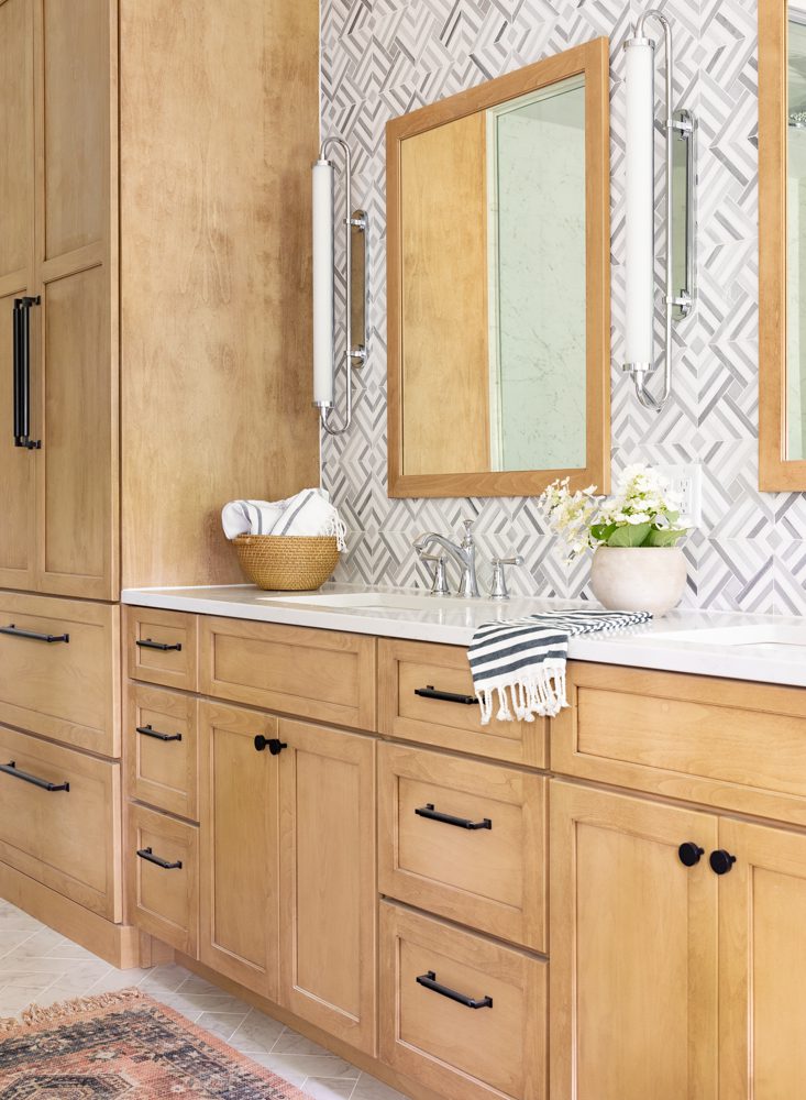 bright vanity with natural wooden cabinetry