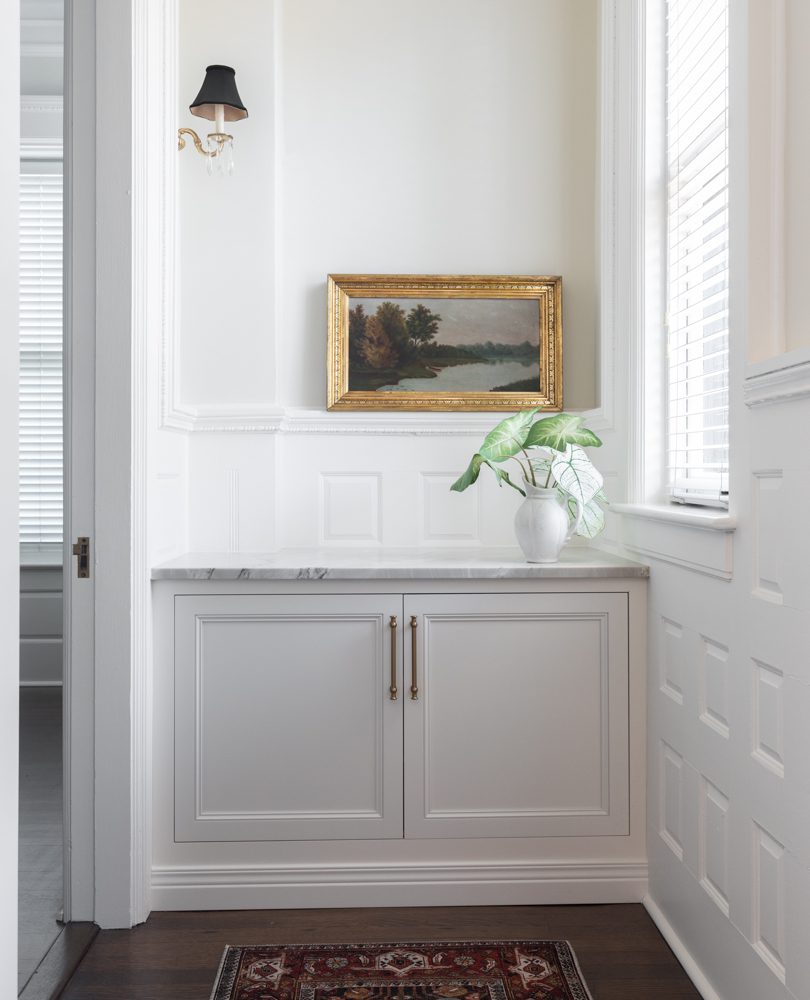 small nook with white cabinetry