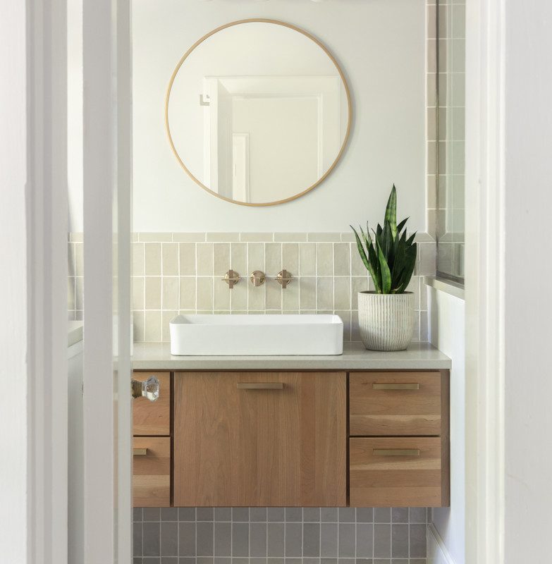 a modern vanity with natural accents and neutrals