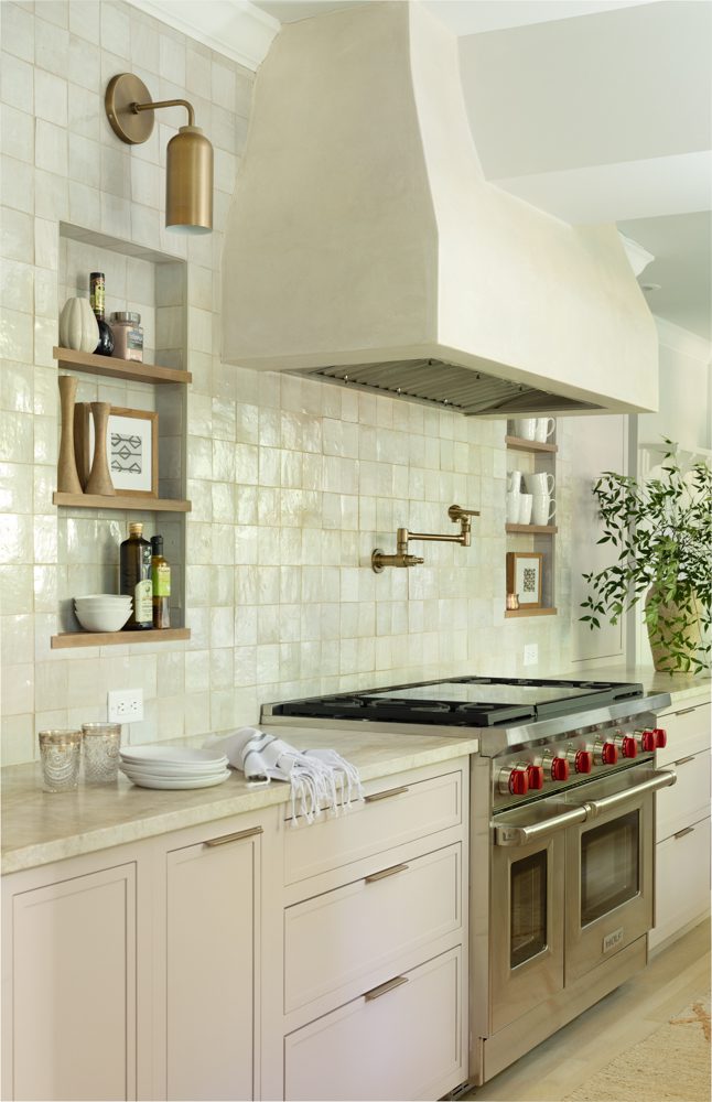 a beige kitchen with a stone oven hood