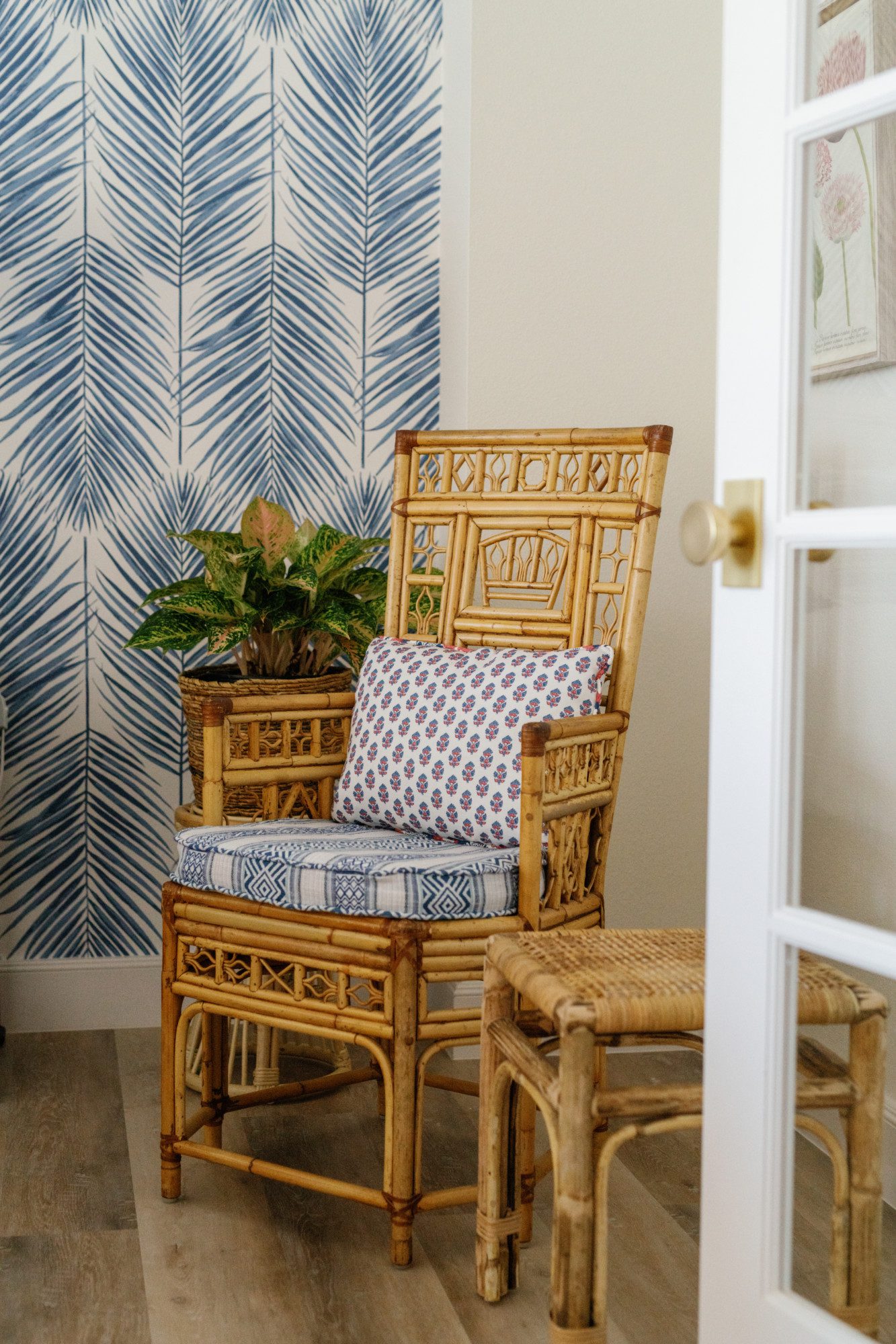 a bamboo chair in a bohemian room