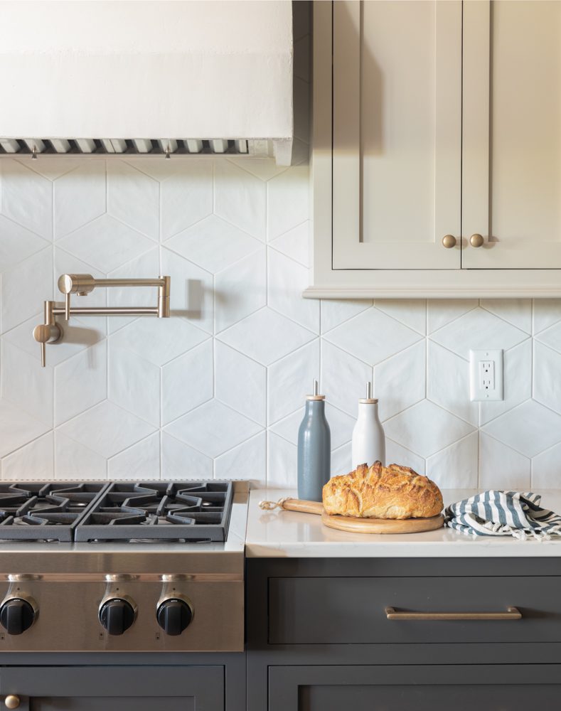 a simple kitchen with geometric tile