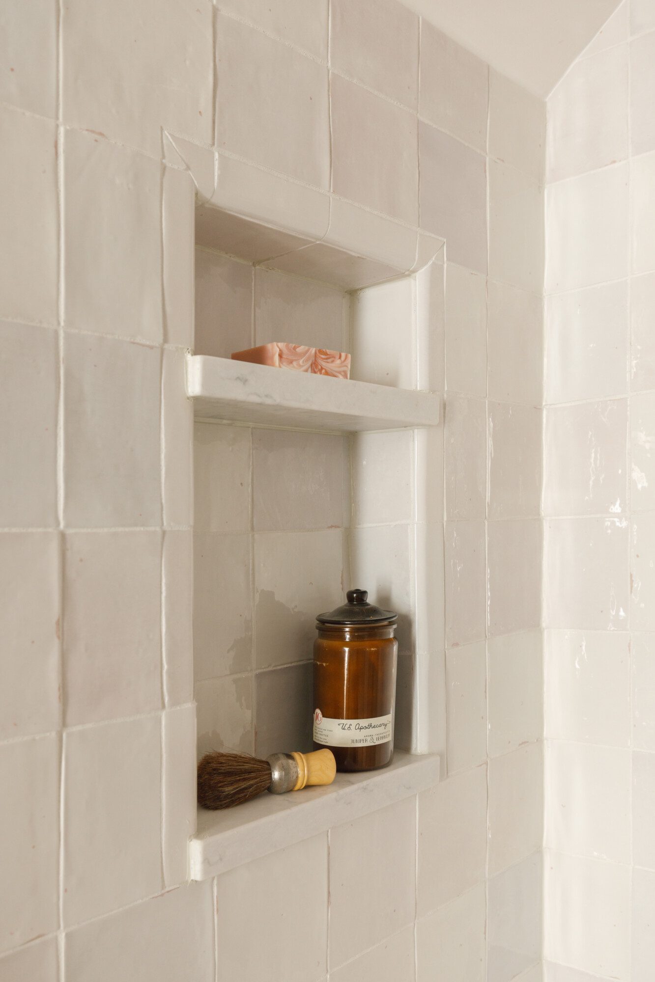 Textured shower tile with storage