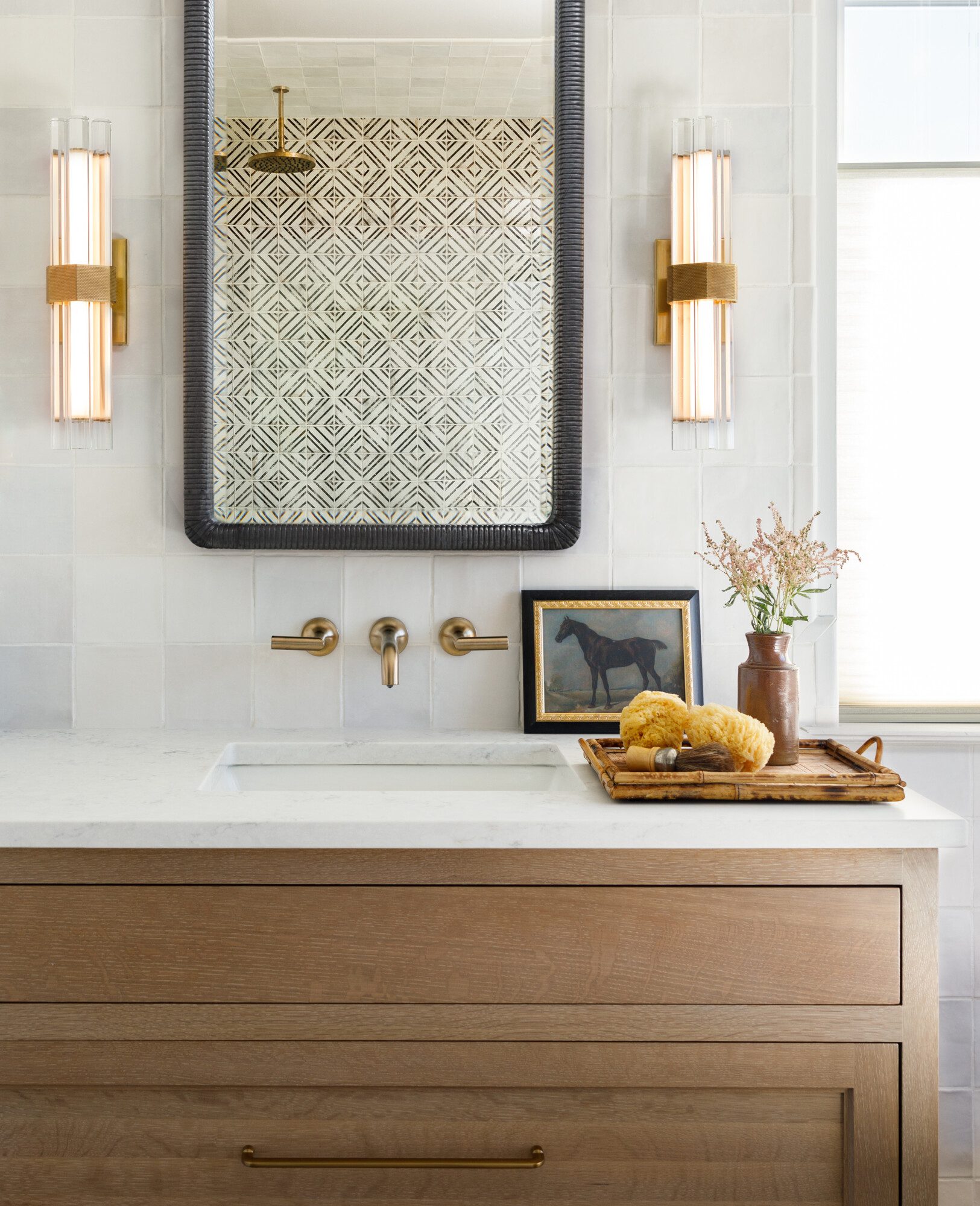 white marble sink with a wood base are the perfect combo