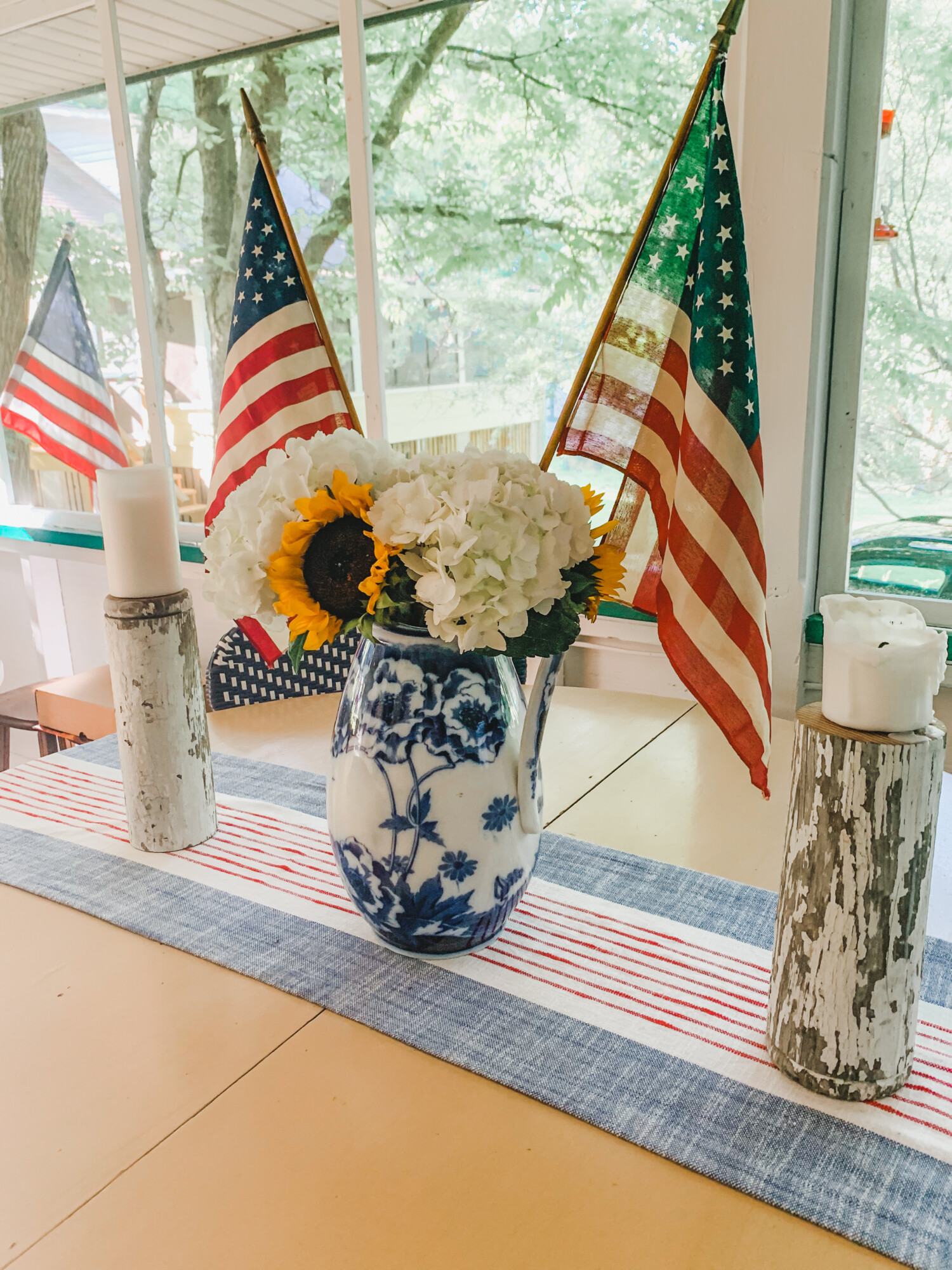 vintage looking vase with flowers and American flags