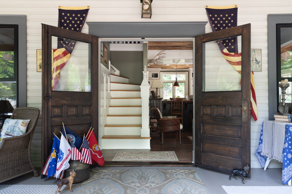 patriotic cottage front door with flags