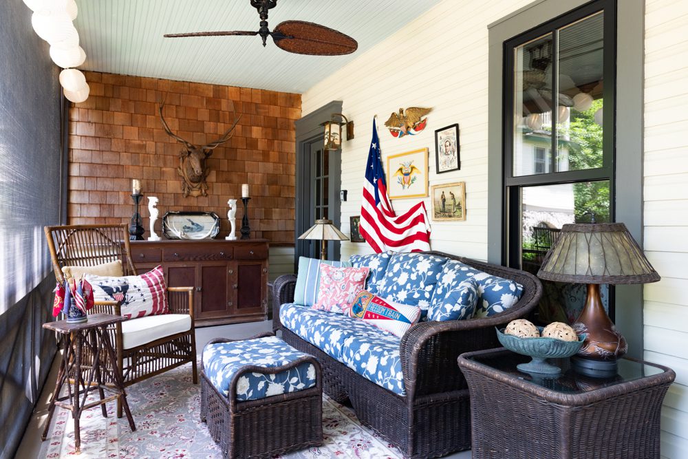 american flags adorn this porch