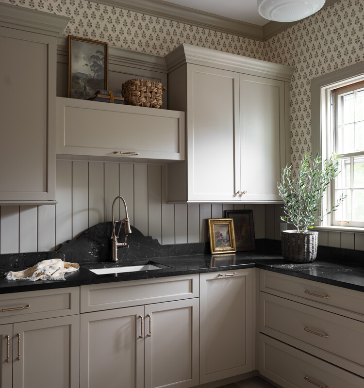 mudroom with sink and cabinetry