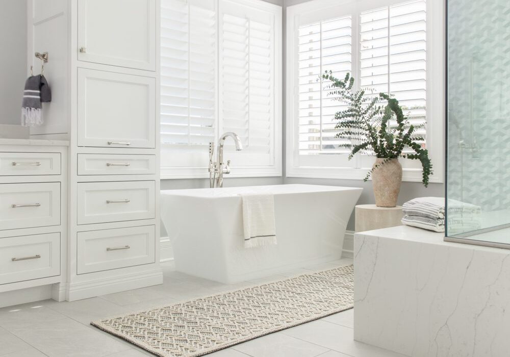Devonshire-20211027-391-Edit-KarrBick Web-2 spacious bright white bathroom with a freestanding tub