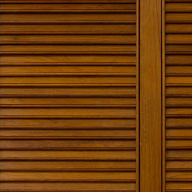 Louvered-Door close up of a wooden cabinet door
