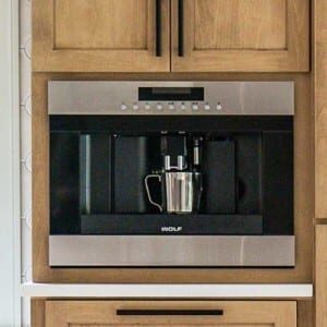 Topping-Estates-Design-Element-3 close up of a built in oven surrounded by natural cabinetry
