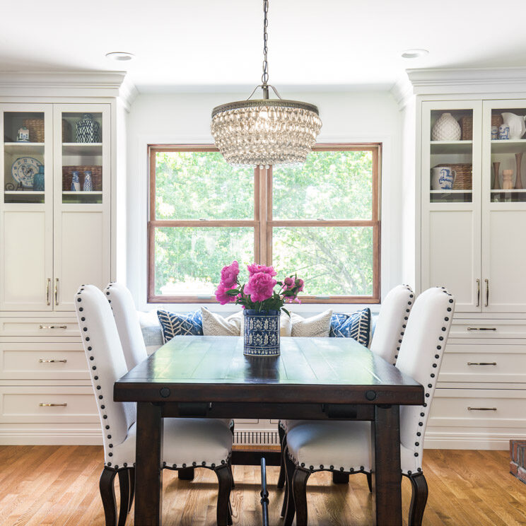 Weber-Hill-Rd-448-Edit2 Bright dining room with white cabinets, dark wood table and white chairs