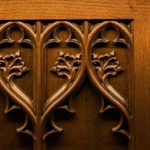 bar-remodel-historic-home-renovation-rausch-afters-element-3 Close-up of wooden engravings