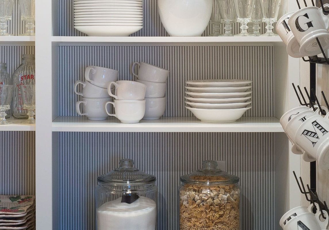 close up of a pantry remodel with lots of shelving and storage space