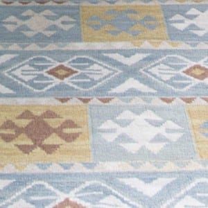 close up of aztec patterned carpet