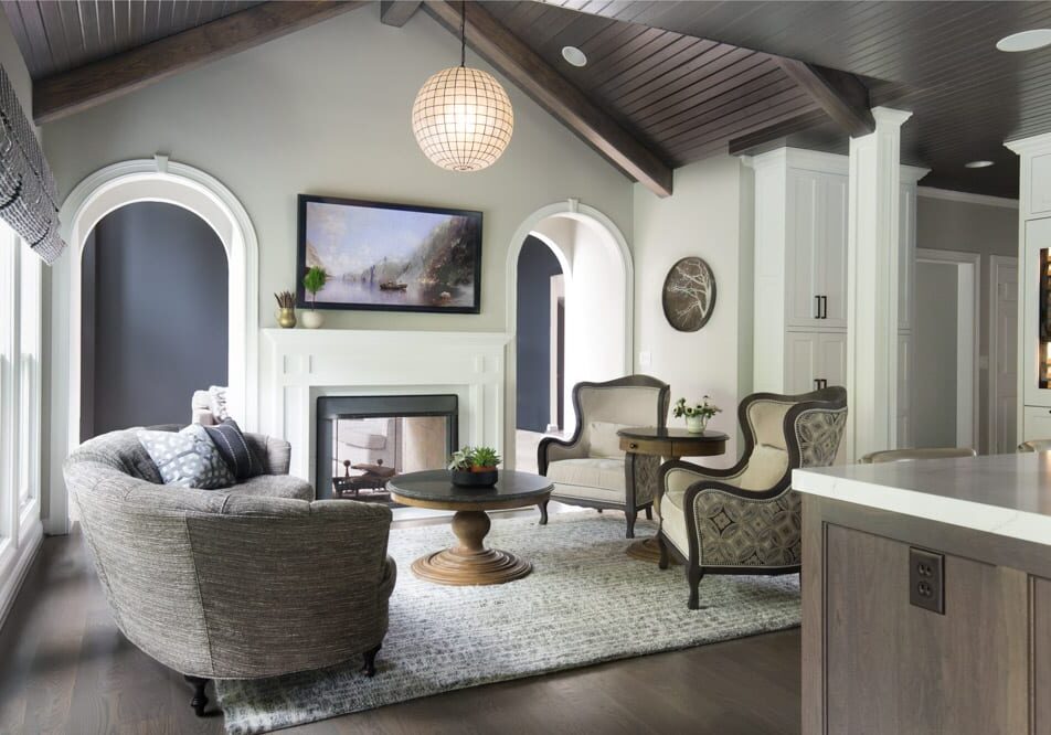 ladue missouri kitchen renovation kitchen designer st louis missouri cooper-after (4) The round geometric designed pendant and dark stained wood shiplap ceiling in the sitting area, adjoined to the kitchen is unexpectedly perfect. It’s all about mixing bold motifs, shapes, and finishes and warming them with wood finishes.