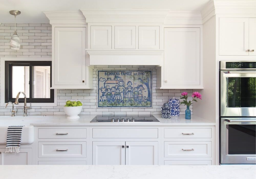 st louis kitchen remodel afters berhens (3) Our client bought the home her parents built. In renovating it, they wanted to honor the family heritage while creating a space to live and host larger gatherings. The custom backsplash anchors the space by celebrating family and welcoming joy.