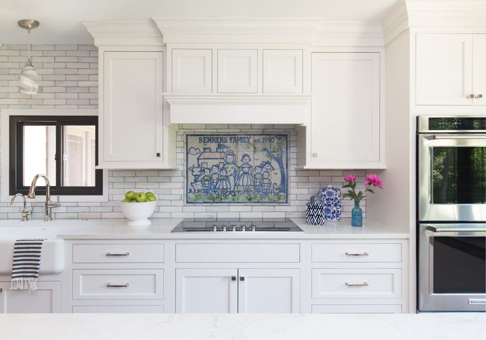 Our client bought the home her parents built. In renovating it, they wanted to honor the family heritage while creating a space to live and host larger gatherings. The custom backsplash anchors the space by celebrating family and welcoming joy.
