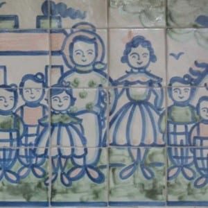 close up of tile with a pastel painted family